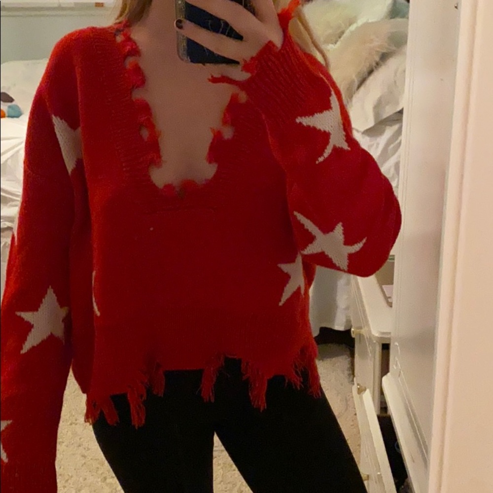 Red sweater with stars